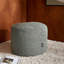 Repose-pieds pouf en tissu bouclé doux et tendance-110438458