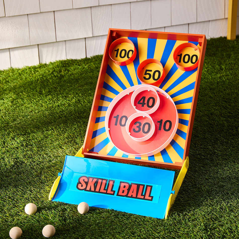 Colorful skill ball lawn game on grass