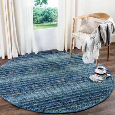 Hossain Hand Loomed Wool Abstract Rug