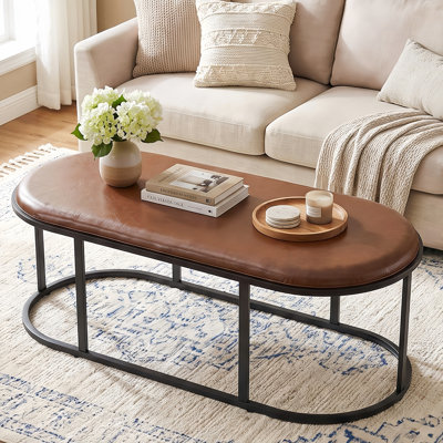 55" Oval Coffee Table With PU Leather Top, Modern Industrial Accent Table With Black Metal Frame, Multi-Functional Table For Living Room, Bedroom & Entryway