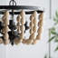 Lustre en bois à quatre lumières
