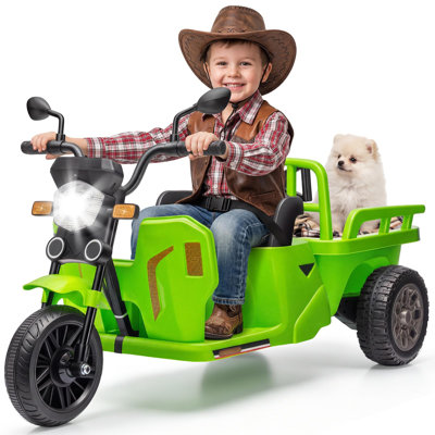 Tricycle à roulettes pour enfant 12V avec remorque, musique Bluetooth, lumière DEL et deux moteurs pour enfants de 3 à 8 ans