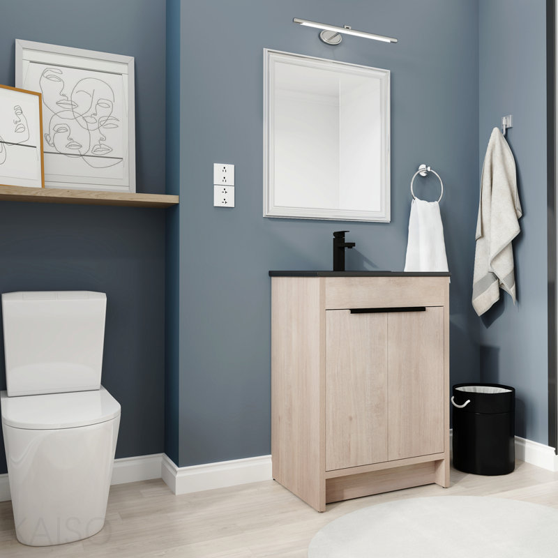 Meuble-lavabo autoportant de 24 po avec lavabo en céramique noire et 2 portes d'armoire à fermeture en douceur