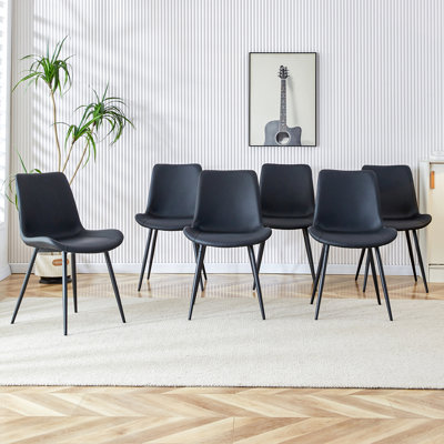 Chaise de salle à manger noire avec pieds en métal et coussin en cuir artificiel
