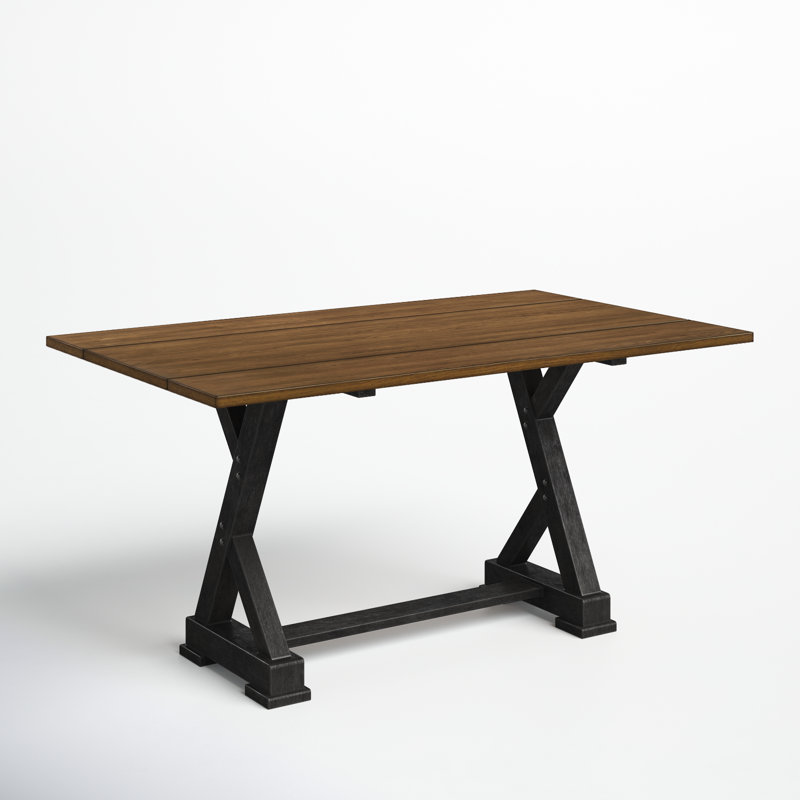 a drop-leaf trestle dining table
