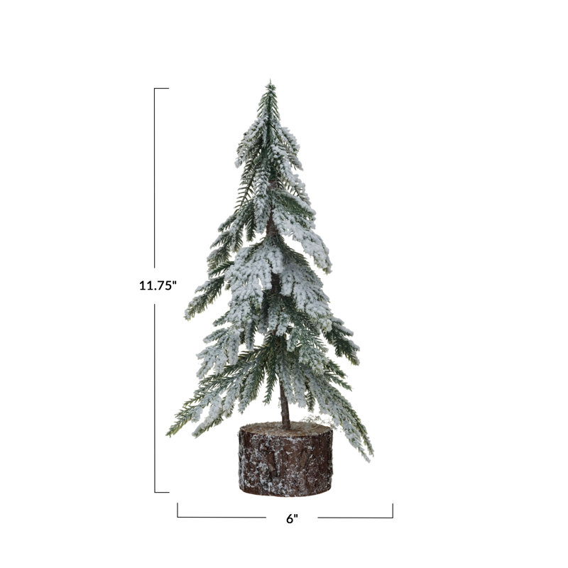 Faux sapin avec base et finition neige