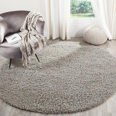 Ashleigh-Marie Solid Color Machine Woven Polypropylene Area Rug in Light Gray