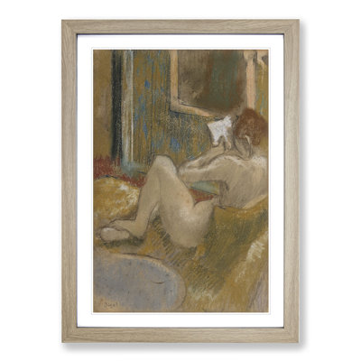 Nude Woman Reading by Edgar Degas - Framed Print