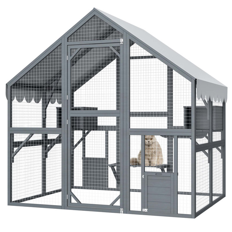 Luxueuse maisonnette d'extérieur pour chat avec plusieurs aires de jeu et caractéristiques de protection