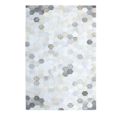 Atomo Cowhide Geometric Area Rug