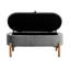 Banc de rangement élégant en velours côtelé gris avec des pieds en bois massif et une base polyvalente d'inspiration Mid-Century