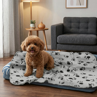 Blankets for Small Canines. Pack of 6 Puppy Blankets. Features an Adorable Paw Print Design. Suitable for Dogs, Puppies, Cats, and Kittens. Dimensions: 24x28 Inches.