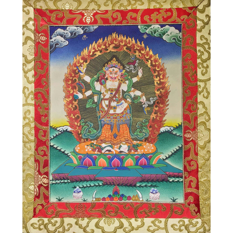 Petit Mahakala blanc à 6 bras monté sur un brocart