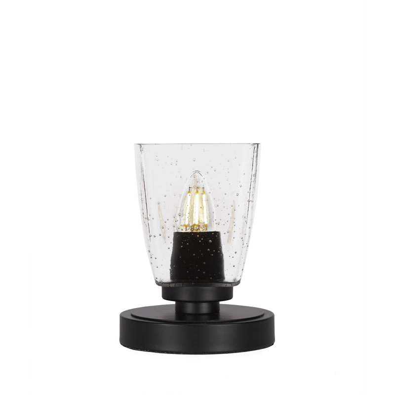 Lampe d'appoint Whitmire présentée en finition noir mat avec verre, Clair