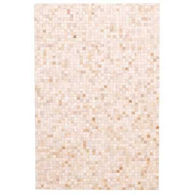 Tapis beige en peau de vache patchwork 5 pi 2 po x 8 pi 0 po