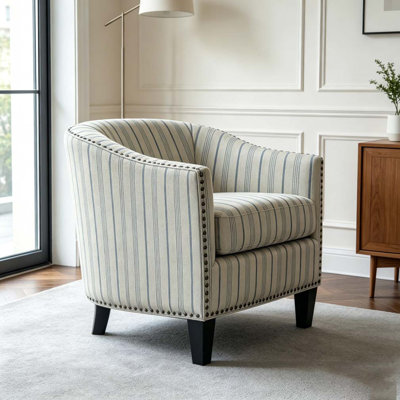Fauteuil demi-tonneau rembourré à rayures