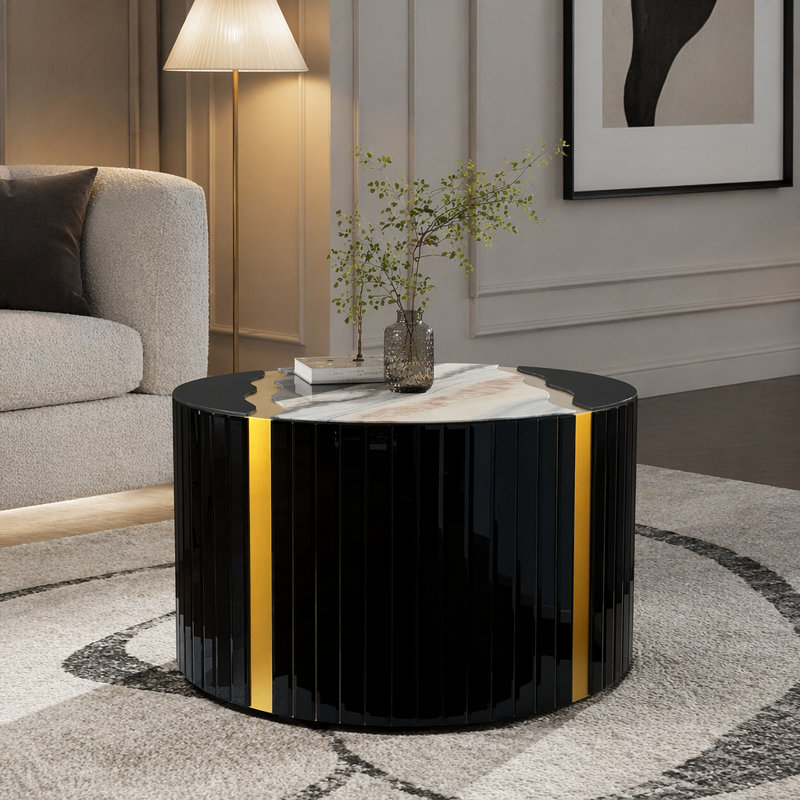 Table basse ronde noire et dorée