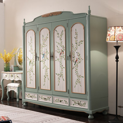 American Country Four-door Wardrobe by Canora Grey