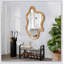 Miroir mural 33,46 x 22,24 de forme irrégulière avec cadre en bois naturel, parfait pour un décor unique et artistique