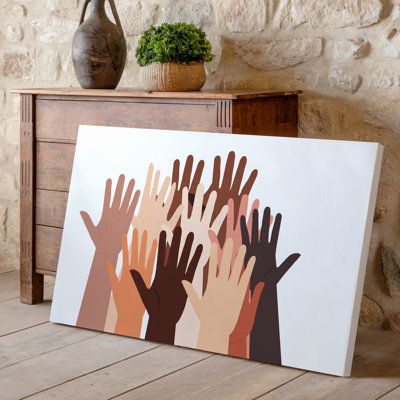 Toile, une illustration vibrante et inspirante mettant en vedette un éventail diversifié de mains tendues vers le haut mettant en valeur des tons de peau variés