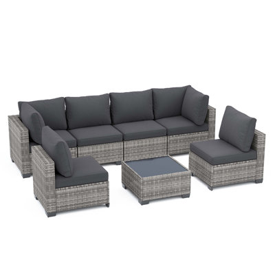 Ensemble de canapé modulaire d'extérieur toutes saisons 7 pièces avec coussins épais et table en verre trempé pour la cour, la piscine et le jardin.