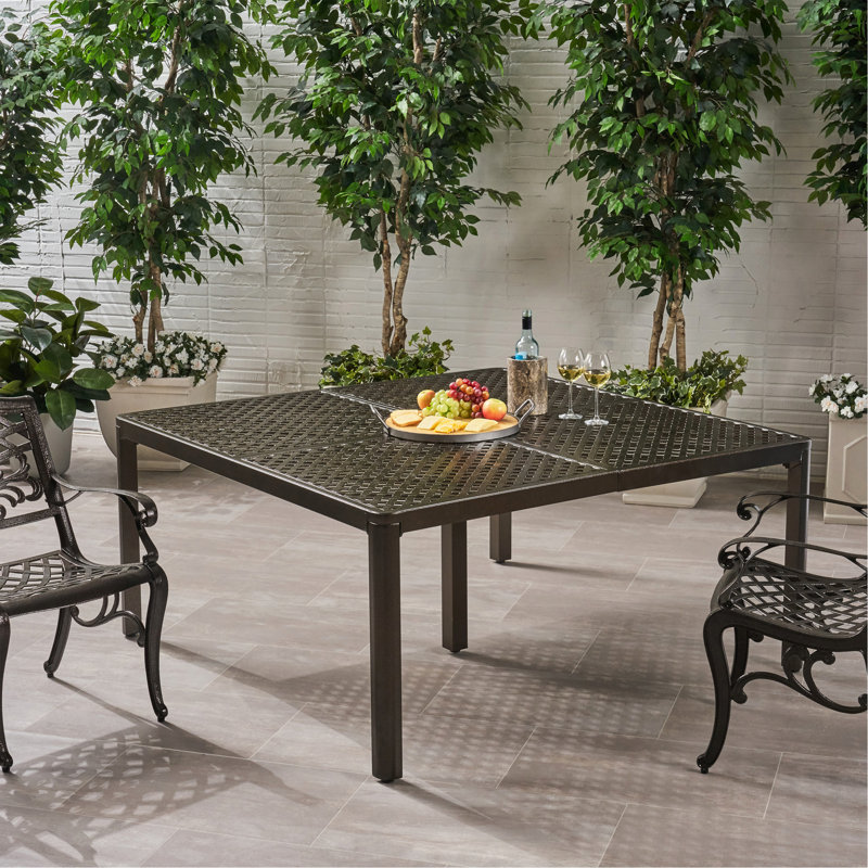 Table de salle à manger d'extérieur moderne en aluminium avec accents tissés, noir brillant