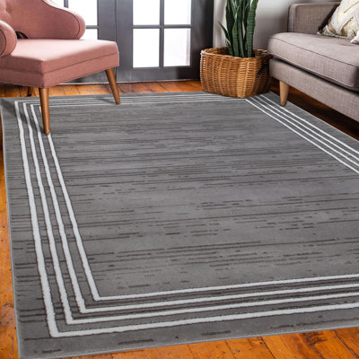 Tapis gris / blanc en polypropylène tissé à la machine Caleal