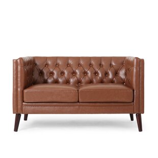 https://assets.wfcdn.com/im/50507146/resize-h310-w310%5Ecompr-r85/1543/154324633/kokesh-535-vegan-leather-loveseat.jpg