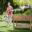 Jardinière surélevée en bois avec tablette de rangement Behn