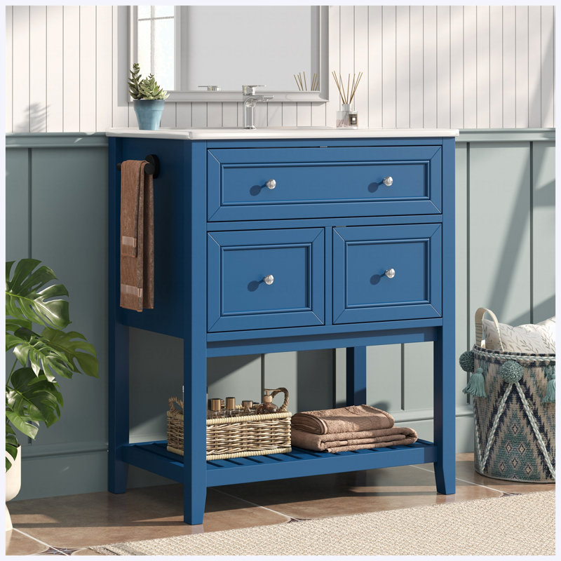 Meuble-lavabo sur pied de 76 cm avec lavabo en céramique, tiroir basculant, 2 tiroirs et tablette ouverte à lattes, porte-serviettes réversible, poignées argentées, bleu marine, MDF