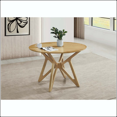 Table de salle à manger ronde en noyer clair avec base géométrique