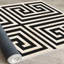 Tapis géométrique noir / blanc Virgie-864296015
