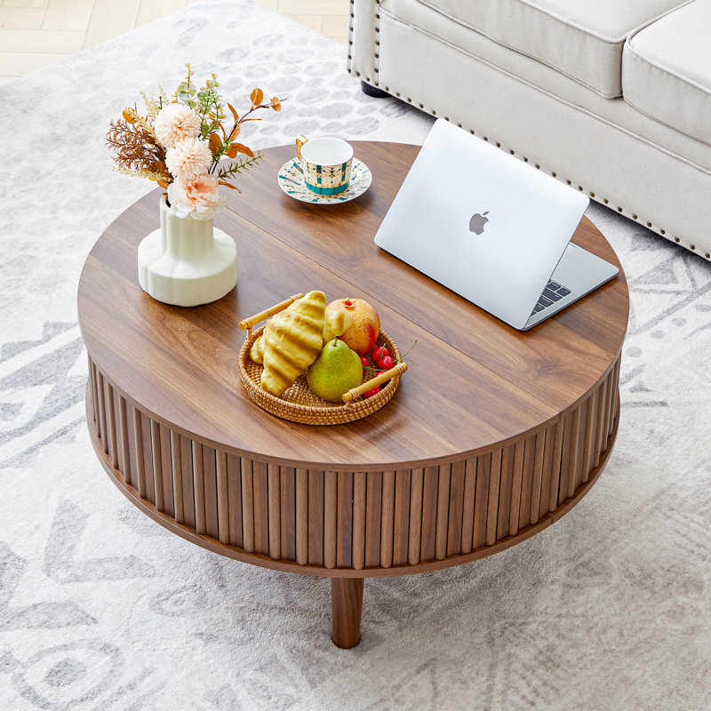 Table basse ronde à plateau relevable avec rangement