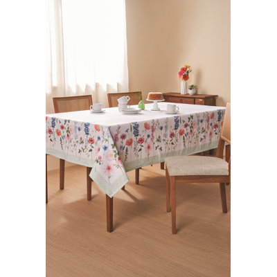 Halida Floral printed tablecloth with wildflowers in shades of pink and blue with light green geometric border