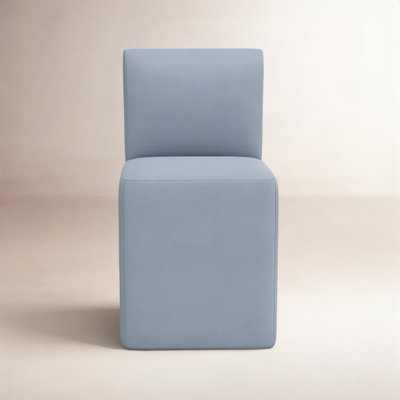 Chaise rembourrée avec roulettes Mendy