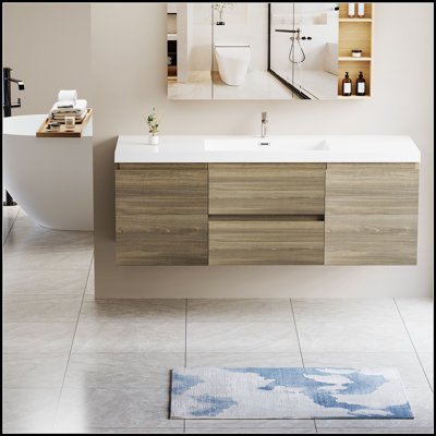 Meuble-lavabo mural moderne avec lavabo en résine, tiroirs à fermeture en douceur et finition gris cendré pour un rangement efficace et un attrait esthétique