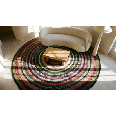 Tapis rond tressé antique à motif circulaire
