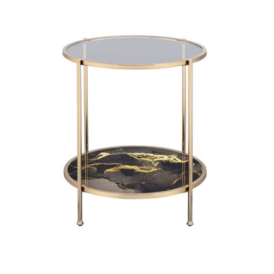 Table de bout avec décoration et pieds en métal poli