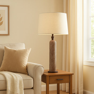 Cziara Tall Resin Floor Lamp With Textured Leaf Pattern Base and Linen Shade