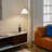 Stina 60" Brass Ring Base Curved Floor Lamp With Triangle White Empire Shade