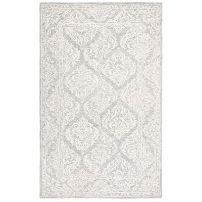 Eldwun Damask Handmade Tufted Wool Area Rug in Ivory