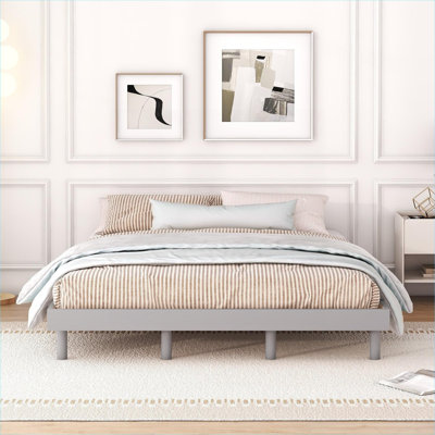 Cool gray modern floating queen platform bed, particle board construction, no box spring required for residential bedroom use