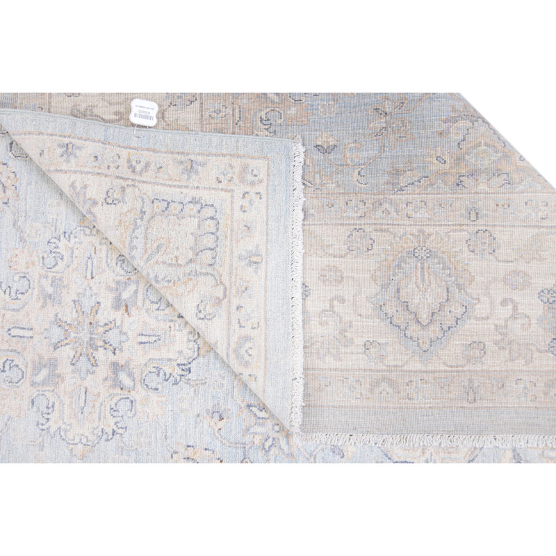 Tapis bleu clair et ivoire noué à la main de haute qualité