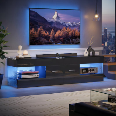 Meuble télé noir ultrabrillant, compatible avec les téléviseurs de 55 à 65 pouces, les panneaux latéraux à motif de pierre, les lumières DEL et les grands tiroirs. Convient aux salons et aux chambres à coucher.