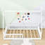 Lit simple en bois en forme de maison avec lattes et garde-corps-2081065602