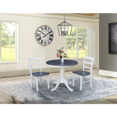 Gadmann Pedestal Extendable Solid Wood Dining Set