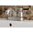 Kingston Brass Kaiser Two-Handle 3-Hole Deck Mount 4" Centerset Bathroom Faucet with Plastic Pop-Up-25314082