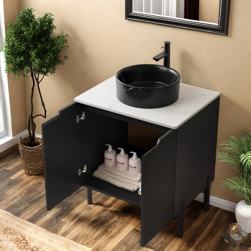 Élégants meubles-lavabos avec lavabo en céramique et comptoir en pierre de Carrare