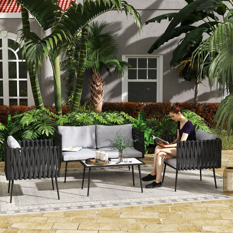Wicker 4 - Person Garden Lounge Set with Cushions