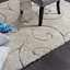 Tapis crème à motif abstrait Allaire-32701700